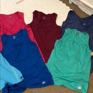 Lot of REI and ARC’TERYX sleeveless tops